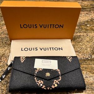 Louis Vuitton Sarah giant jungle monogram wallet
